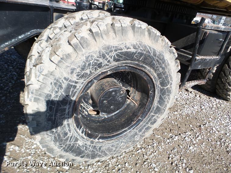 image for item EW9985 1985 Caterpillar 206 rubber tire excavator