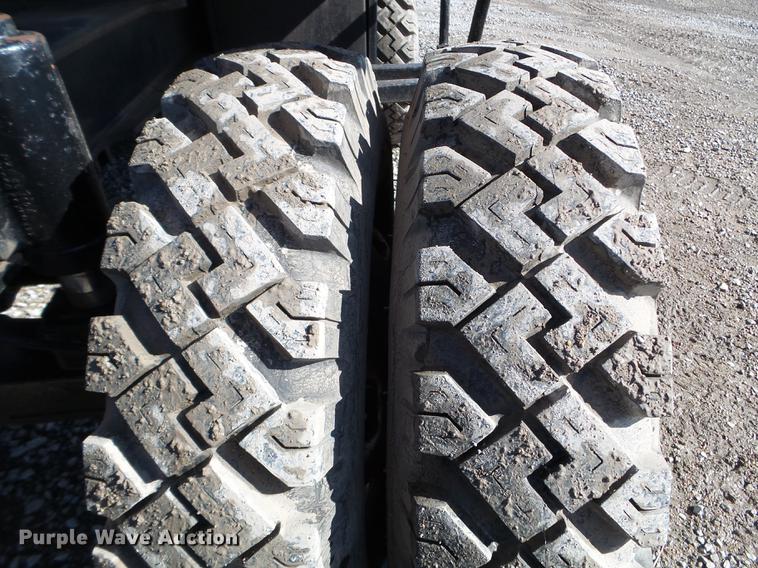 image for item EW9985 1985 Caterpillar 206 rubber tire excavator