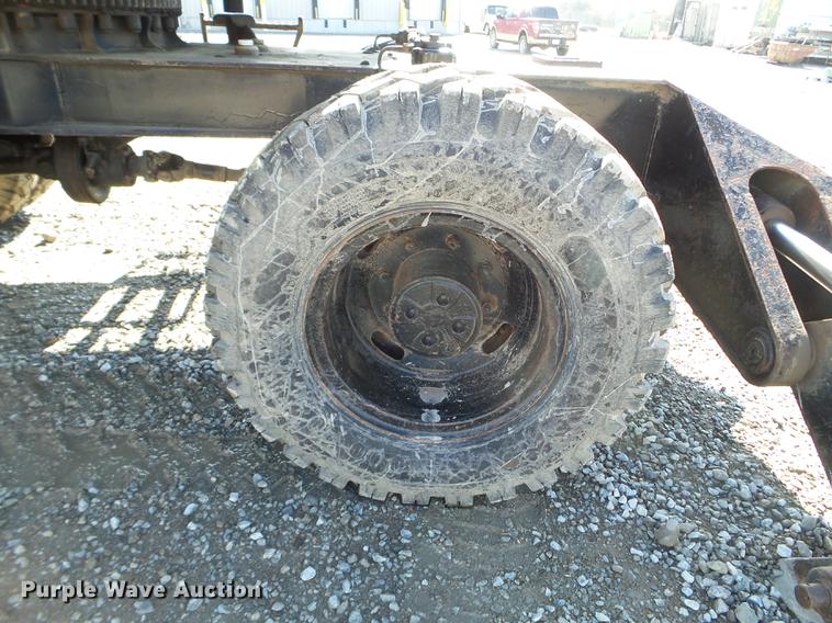 image for item EW9985 1985 Caterpillar 206 rubber tire excavator