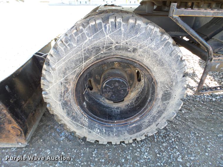 image for item EW9985 1985 Caterpillar 206 rubber tire excavator