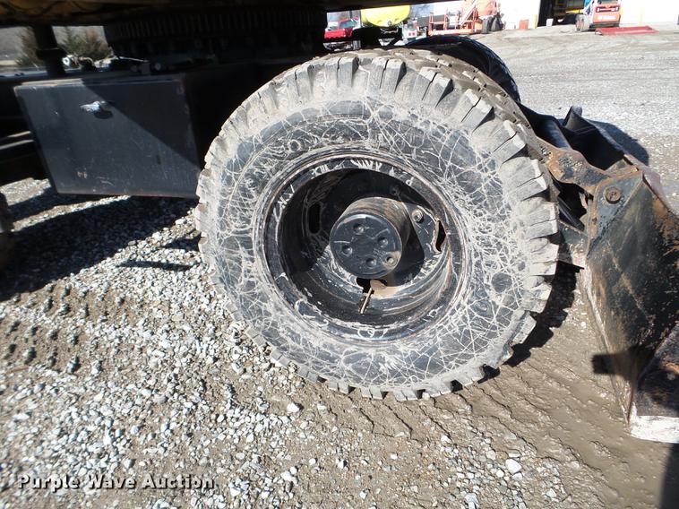 image for item EW9985 1985 Caterpillar 206 rubber tire excavator