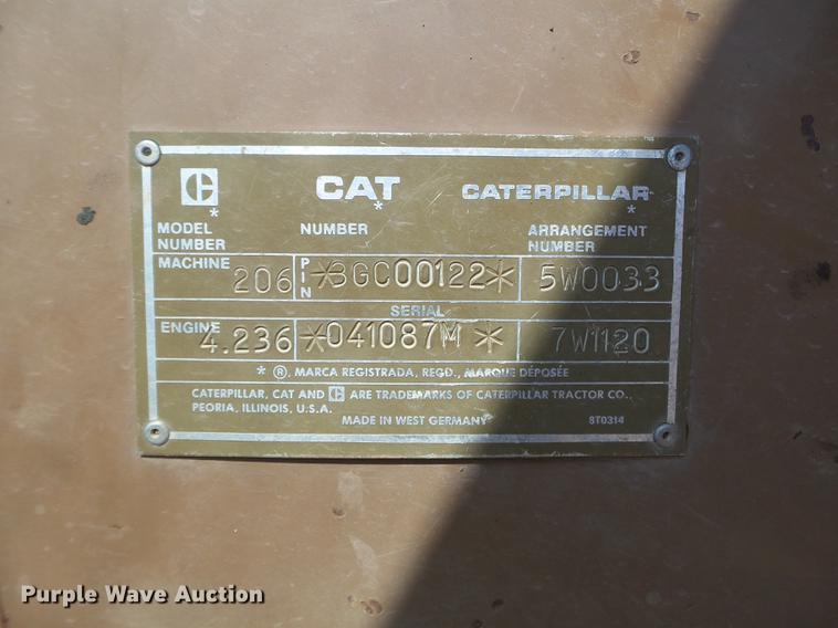 image for item EW9985 1985 Caterpillar 206 rubber tire excavator