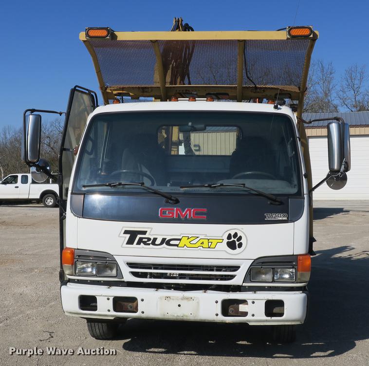 image for item DB8868 2003 GMC W5500 TrucKat flatbed truck