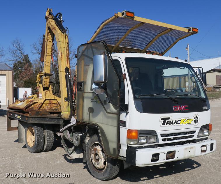 image for item DB8868 2003 GMC W5500 TrucKat flatbed truck