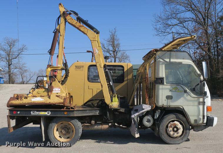 image for item DB8868 2003 GMC W5500 TrucKat flatbed truck