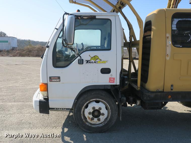 image for item DB8868 2003 GMC W5500 TrucKat flatbed truck