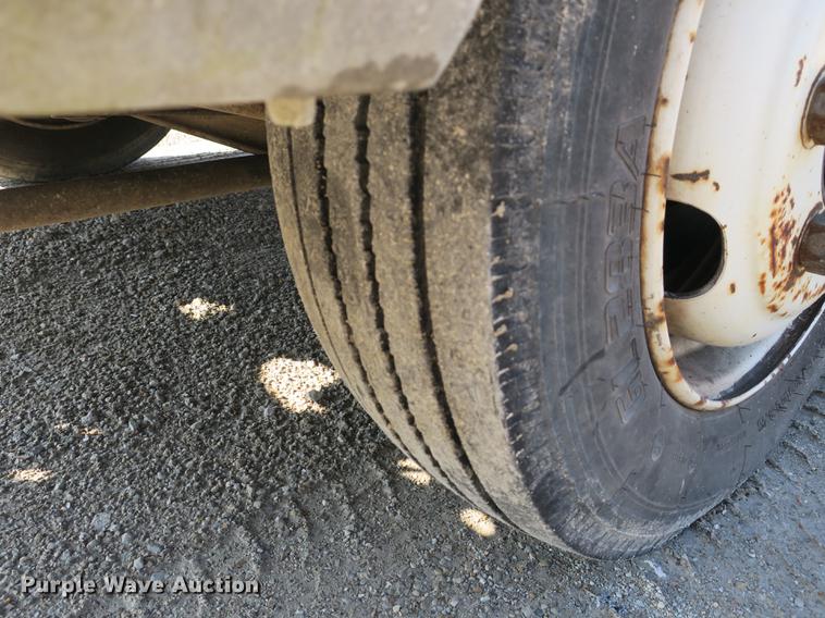 image for item DB8868 2003 GMC W5500 TrucKat flatbed truck