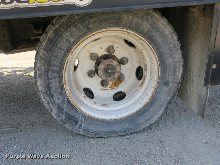 image for item DB8868 2003 GMC W5500 TrucKat flatbed truck