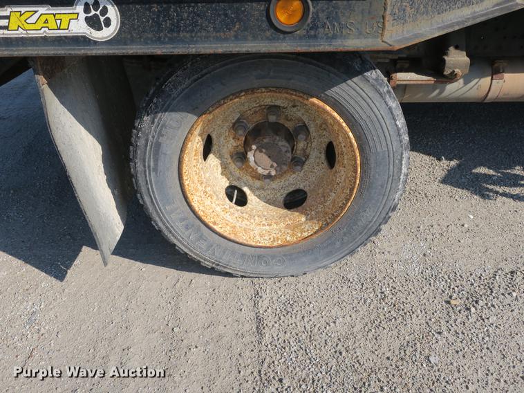 image for item DB8868 2003 GMC W5500 TrucKat flatbed truck