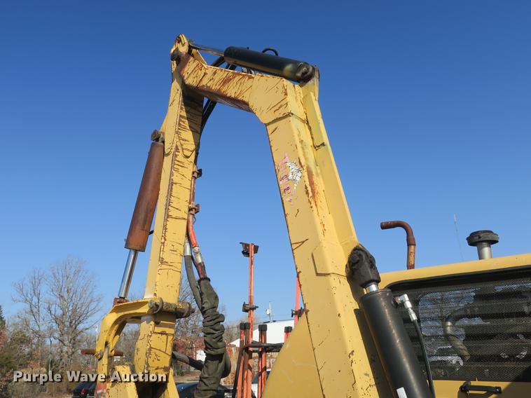 image for item DB8868 2003 GMC W5500 TrucKat flatbed truck