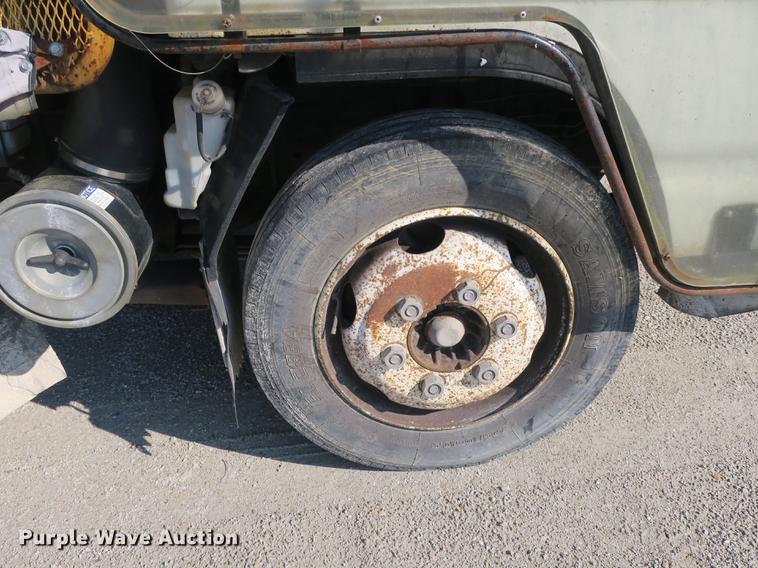 image for item DB8868 2003 GMC W5500 TrucKat flatbed truck