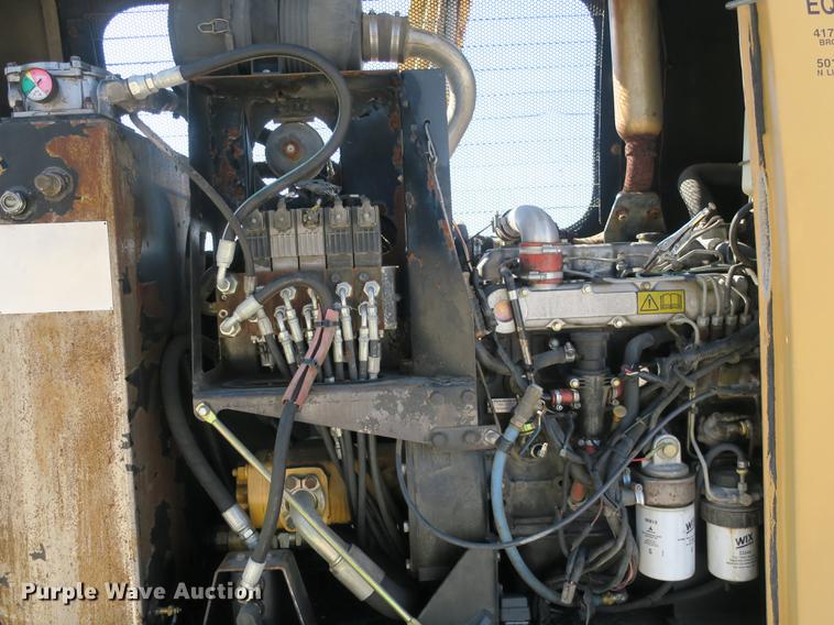 image for item DB8868 2003 GMC W5500 TrucKat flatbed truck