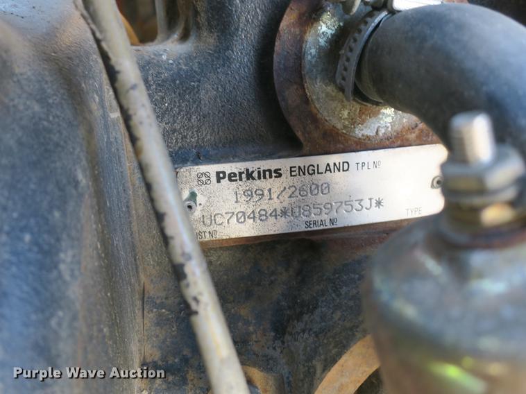 image for item DB8868 2003 GMC W5500 TrucKat flatbed truck