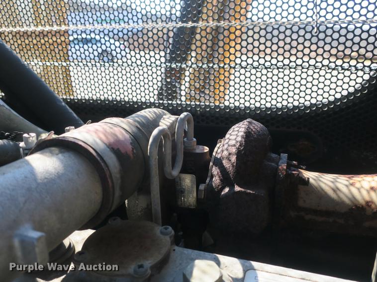 image for item DB8868 2003 GMC W5500 TrucKat flatbed truck