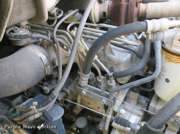 image for item DB8868 2003 GMC W5500 TrucKat flatbed truck