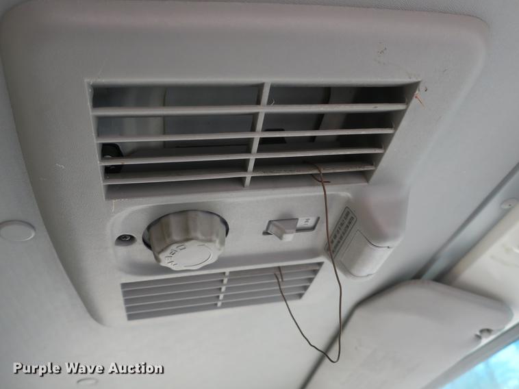 image for item DB8868 2003 GMC W5500 TrucKat flatbed truck