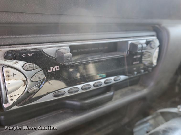 image for item DB8868 2003 GMC W5500 TrucKat flatbed truck