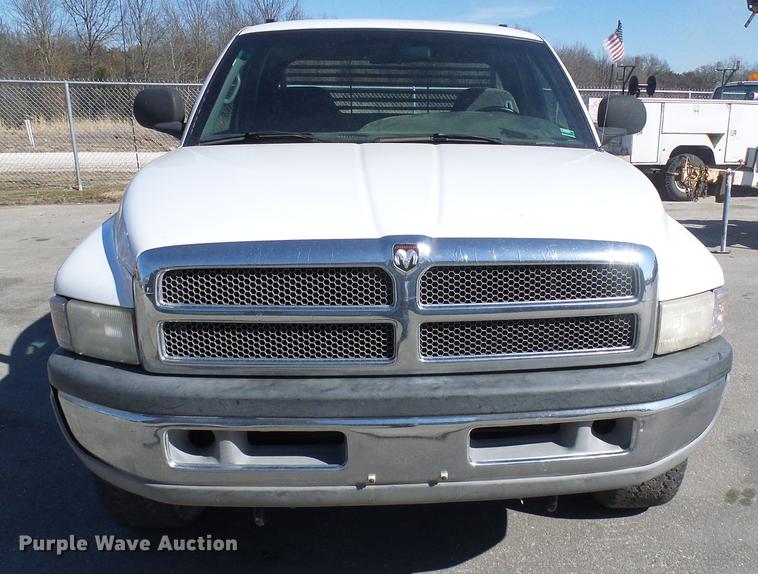 image for item DF7157 1999 Dodge Ram 1500 Ext. Cab flatbed pickup truck