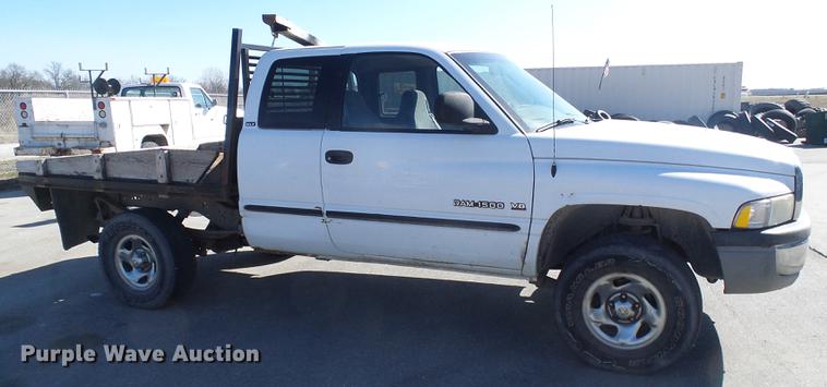 image for item DF7157 1999 Dodge Ram 1500 Ext. Cab flatbed pickup truck