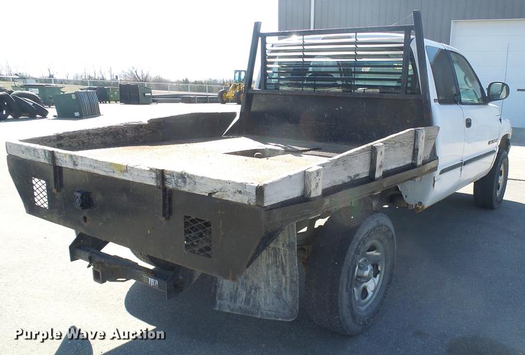 image for item DF7157 1999 Dodge Ram 1500 Ext. Cab flatbed pickup truck