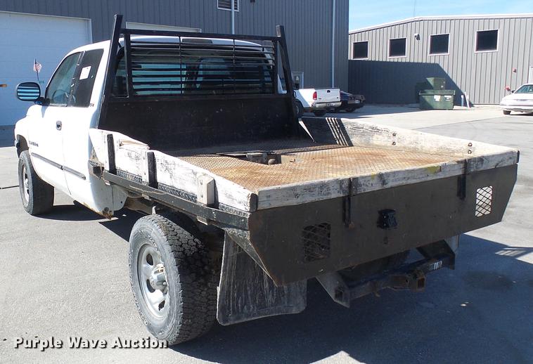 image for item DF7157 1999 Dodge Ram 1500 Ext. Cab flatbed pickup truck