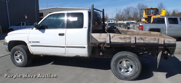 image for item DF7157 1999 Dodge Ram 1500 Ext. Cab flatbed pickup truck