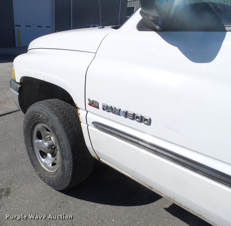 image for item DF7157 1999 Dodge Ram 1500 Ext. Cab flatbed pickup truck