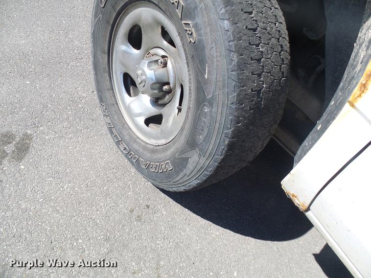 image for item DF7157 1999 Dodge Ram 1500 Ext. Cab flatbed pickup truck