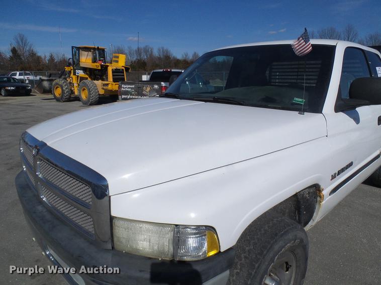 image for item DF7157 1999 Dodge Ram 1500 Ext. Cab flatbed pickup truck