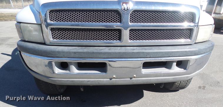 image for item DF7157 1999 Dodge Ram 1500 Ext. Cab flatbed pickup truck