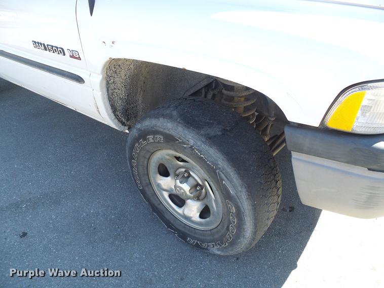 image for item DF7157 1999 Dodge Ram 1500 Ext. Cab flatbed pickup truck