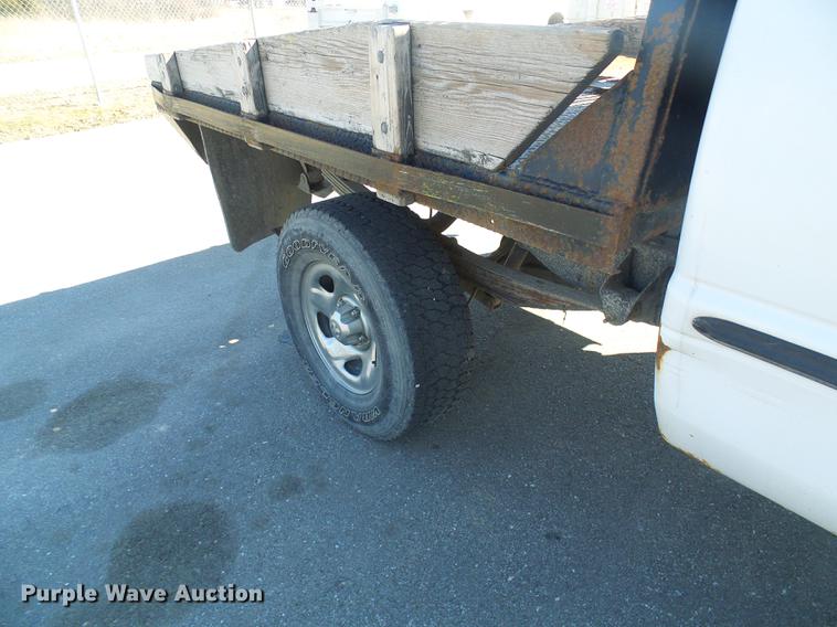 image for item DF7157 1999 Dodge Ram 1500 Ext. Cab flatbed pickup truck