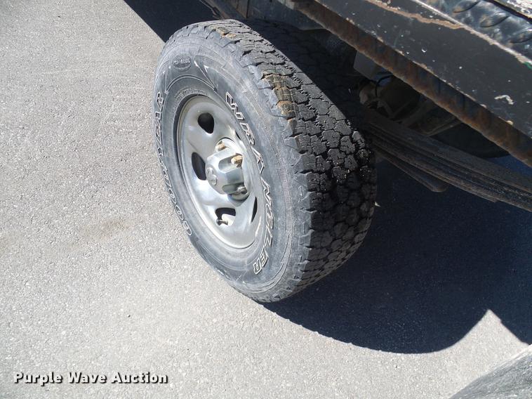 image for item DF7157 1999 Dodge Ram 1500 Ext. Cab flatbed pickup truck