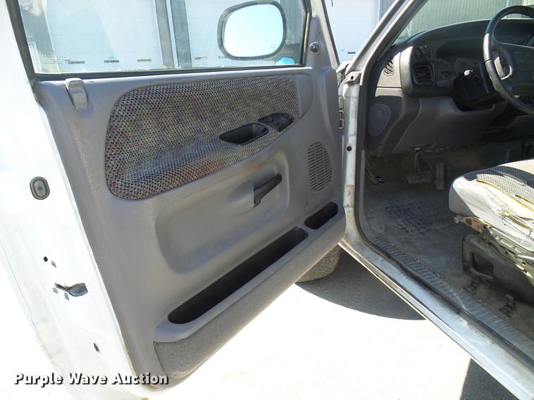 image for item DF7157 1999 Dodge Ram 1500 Ext. Cab flatbed pickup truck