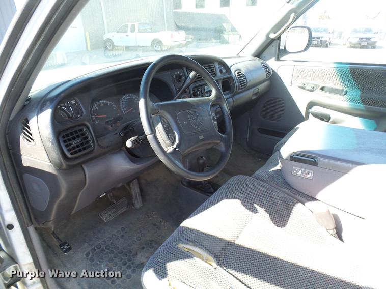 image for item DF7157 1999 Dodge Ram 1500 Ext. Cab flatbed pickup truck