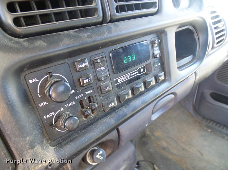 image for item DF7157 1999 Dodge Ram 1500 Ext. Cab flatbed pickup truck