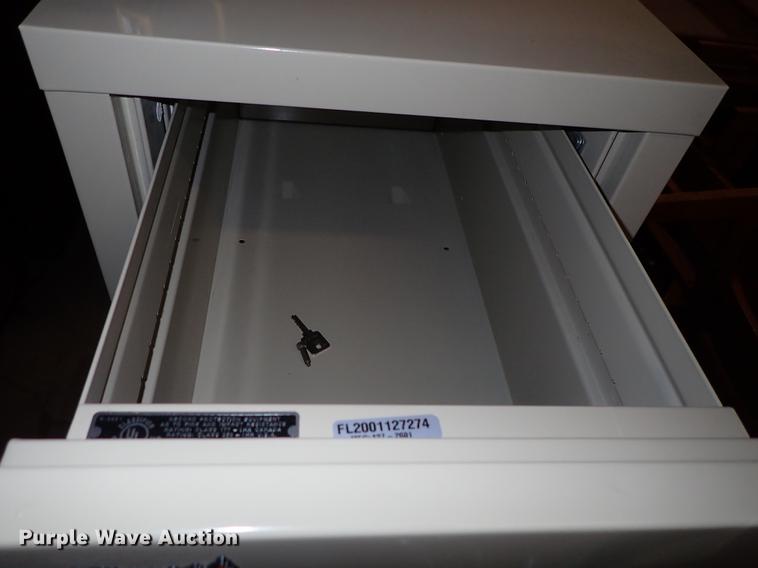 image for item EH9184 Fire King four drawer file cabinet