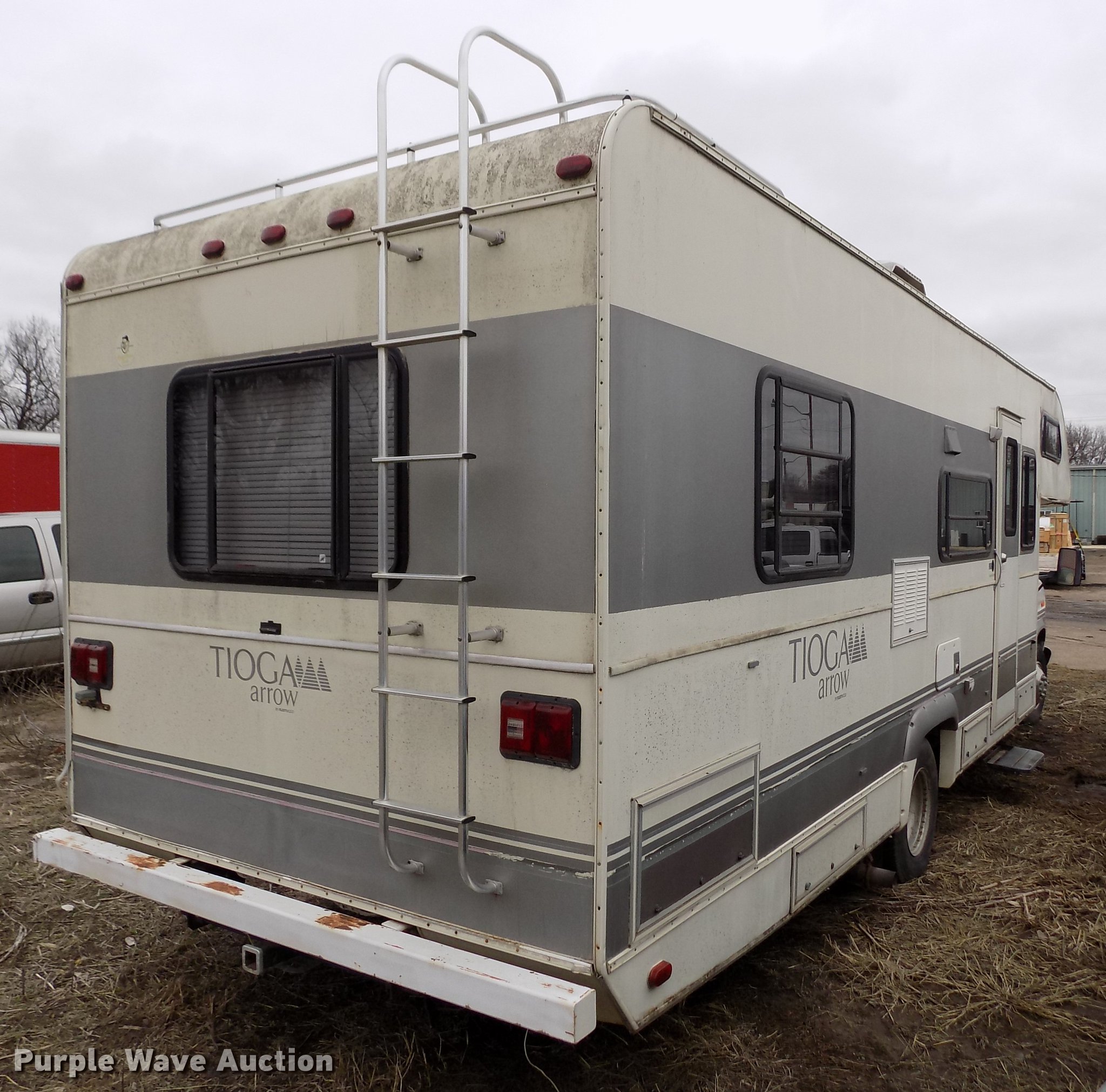 1991 Ford Econoline E350 Tioga Arrow RV in Concordia, KS Item FA9542 sold Purple Wave