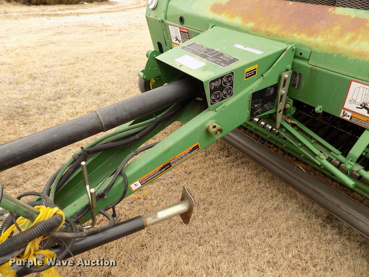 image for item FA9516 2009 John Deere 568 Mega Wide Plus round baler