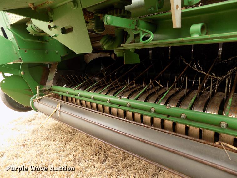 image for item FA9516 2009 John Deere 568 Mega Wide Plus round baler