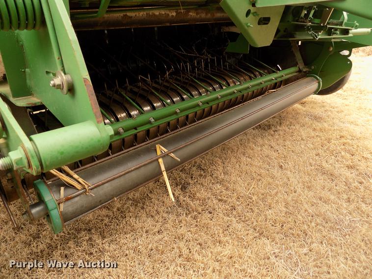 image for item FA9516 2009 John Deere 568 Mega Wide Plus round baler