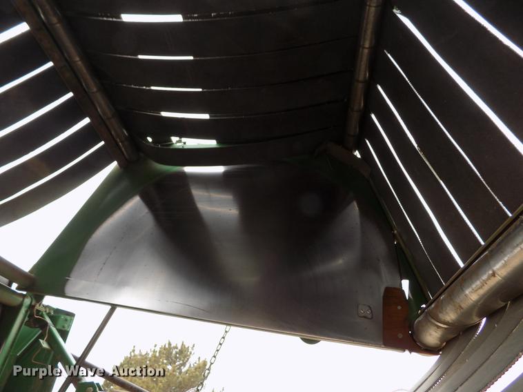 image for item FA9516 2009 John Deere 568 Mega Wide Plus round baler