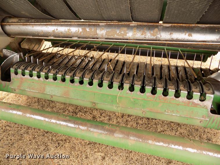 image for item FA9516 2009 John Deere 568 Mega Wide Plus round baler