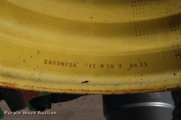 image for item FE9601 (3) John Deere 28L-26 wheels and spindle