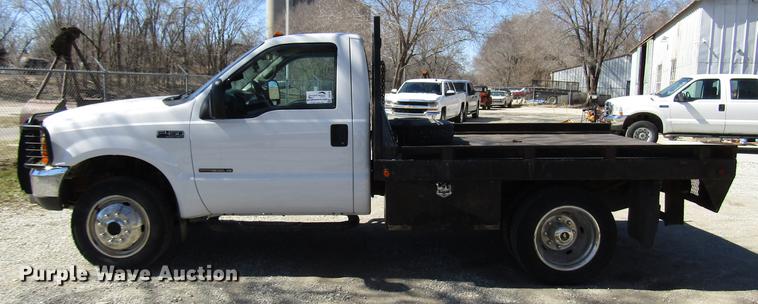 image for item DB6765 1999 Ford F450 Super Duty flatbed truck