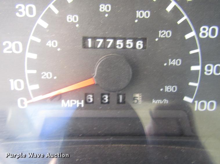 image for item DB6765 1999 Ford F450 Super Duty flatbed truck