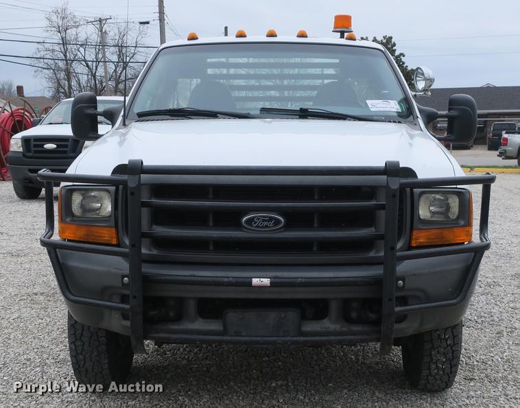 image for item DB8837 1999 Ford F350 Super Duty flatbed pickup truck