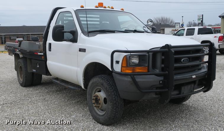 image for item DB8837 1999 Ford F350 Super Duty flatbed pickup truck