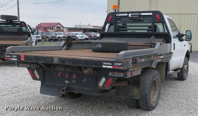 image for item DB8837 1999 Ford F350 Super Duty flatbed pickup truck