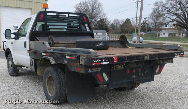 image for item DB8837 1999 Ford F350 Super Duty flatbed pickup truck